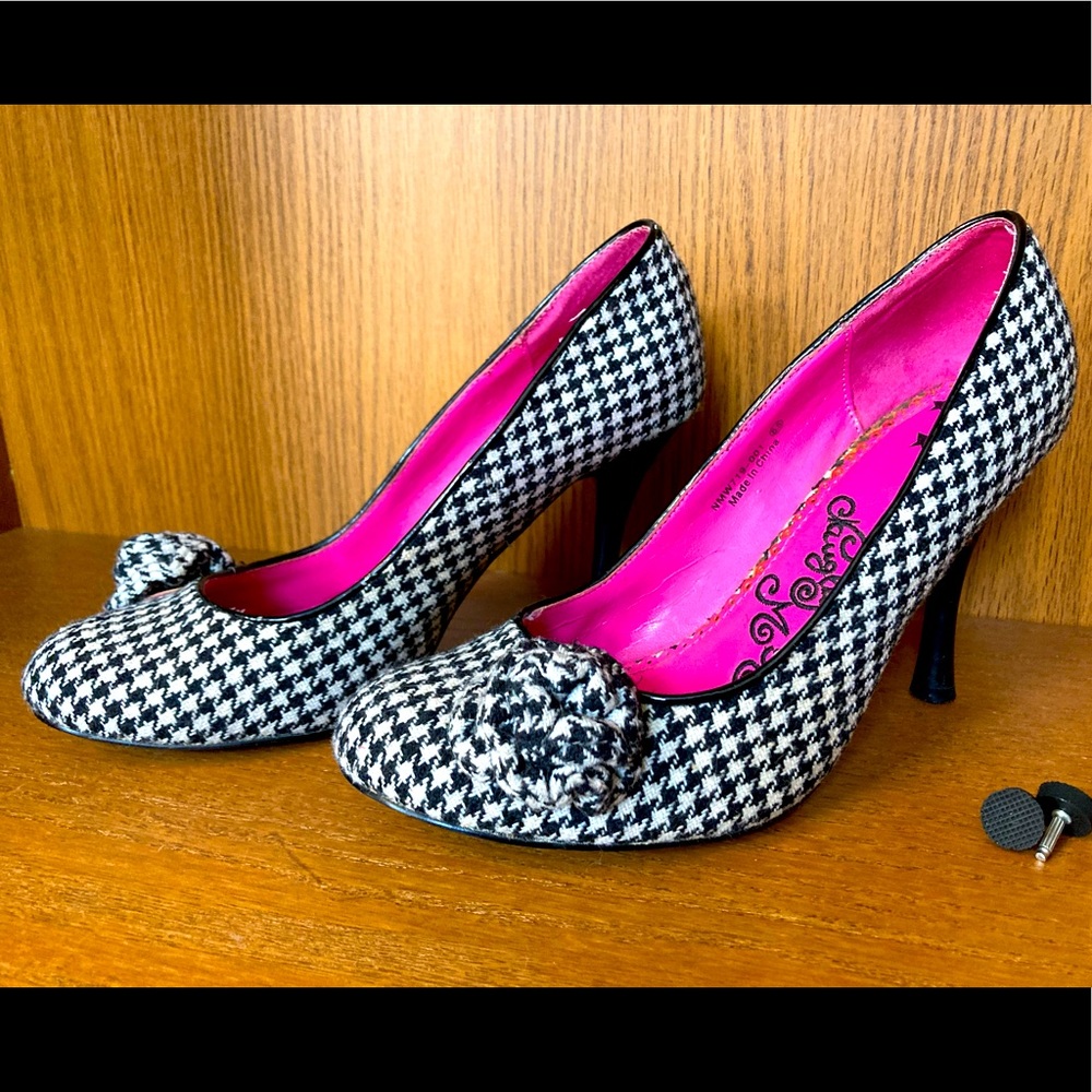 Naughty Monkey houndstooth pumps with spool heel.
